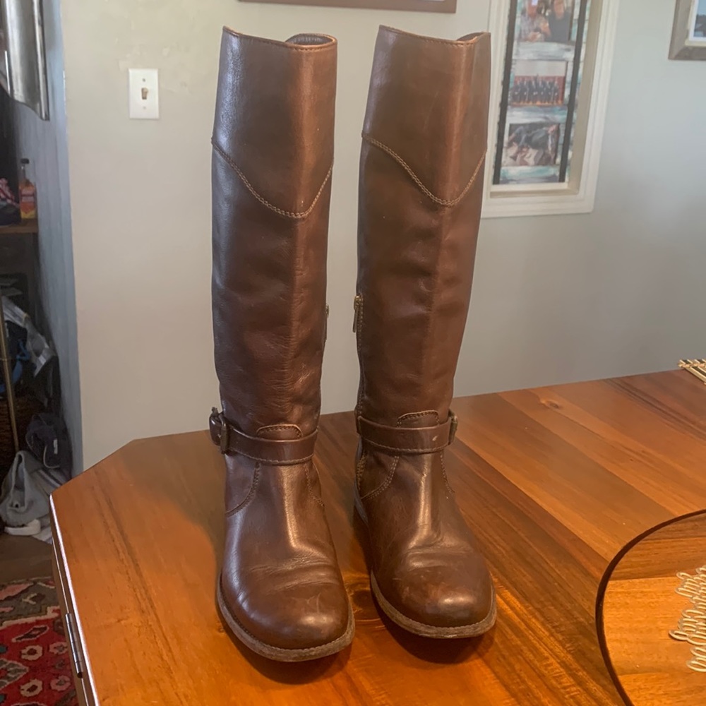 Frye ladies tall boots. Interior lower zip.